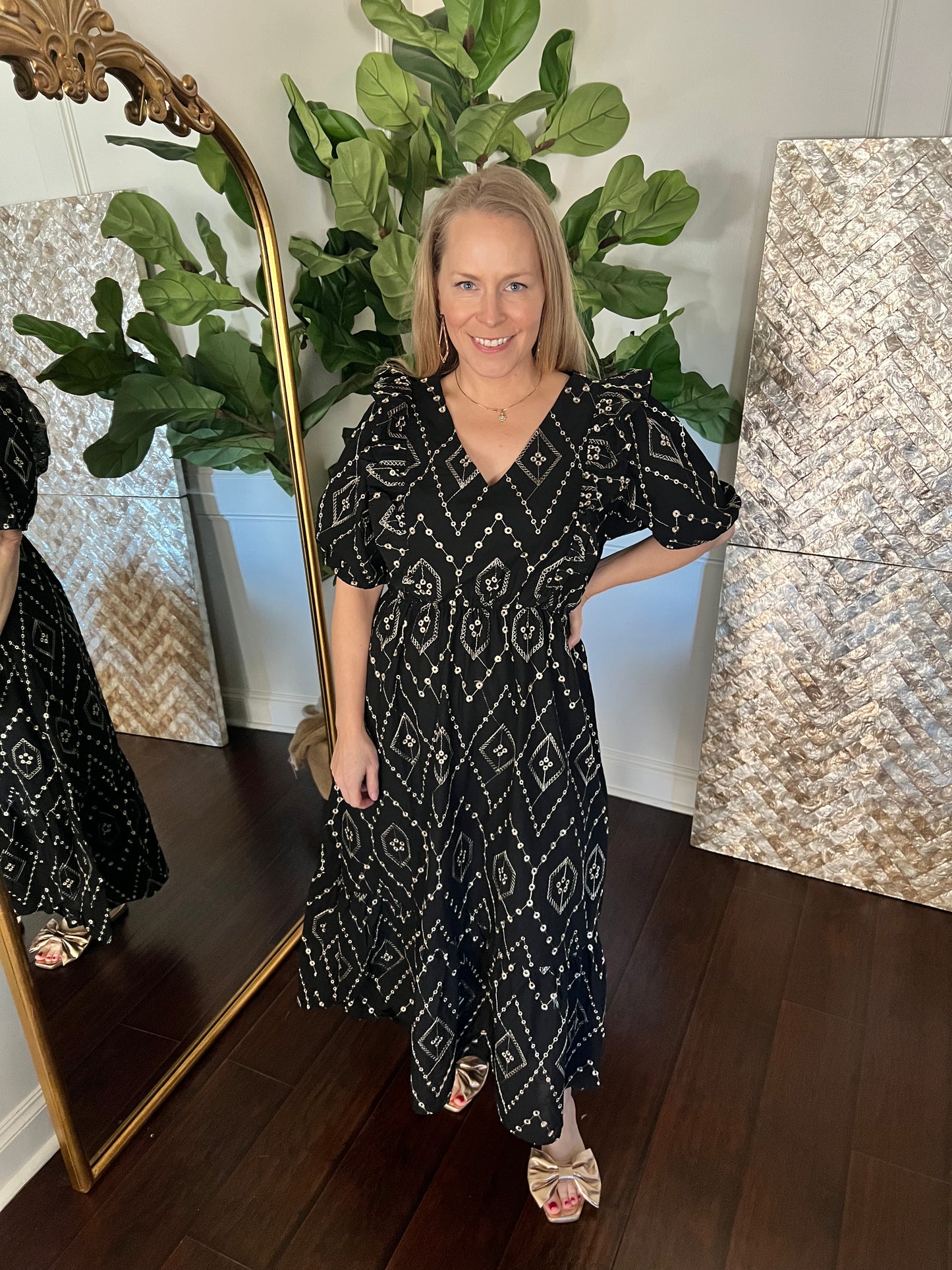 black and gold eye let midi dress